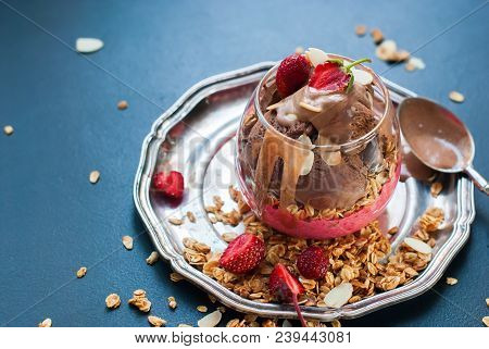 Chocolate Ice Cream Glass Cup Decorated With Strawberry Scattered Muesli Harmful Food Dark Backgroun