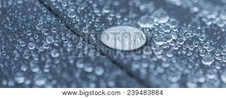 Detail Of Fabric Water Repellent, Close Up On An Outdoor Jacket Material With Water Drops