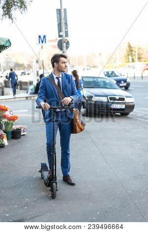 Bucharest, Romania, - Octomber 26, 2017: Using Electric Scooter On The Street On A Sunny Day With Sa