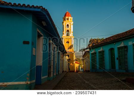 Trinidad, Cuba. The Bell Tower Of San Francisco De Asis. Street In The Center Of The Cuban City.