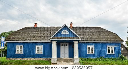 Trakai, Lithuania - August 15, 2017: Beautiful old wooden buildings near Trakai lake. Streets of Tra
