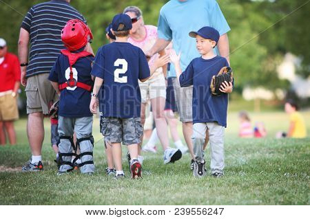 High Five line after a children's  baseball game