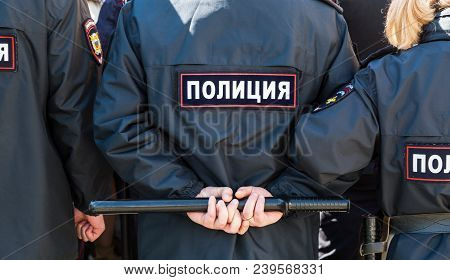 Samara, Russia - May 5, 2018: Russian Policeman With Police Truncheon. Text In Russian: Police