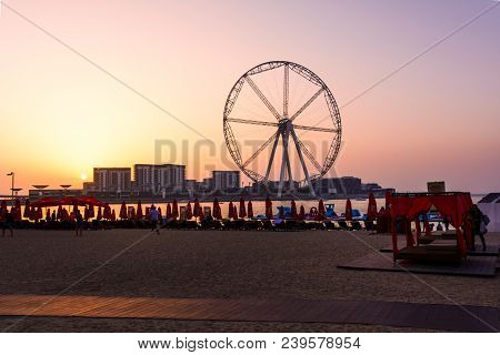 Dubai, United Arab Emirates - March 8, 2018: Sunbeds And Romantic Sunset At Jbr, Jumeira Beach Resor