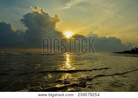Sunrise Over The Sea With Nice Clouds