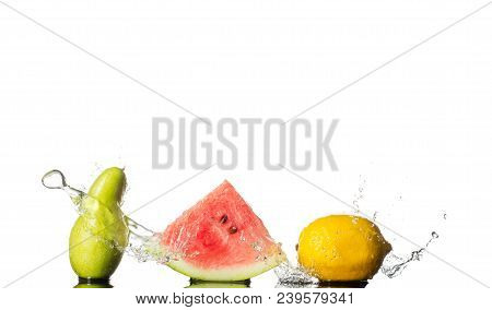 Fresh Fruits Splash. Pear, Watermalon And Lemon With Water Wave Isolated On White Background .