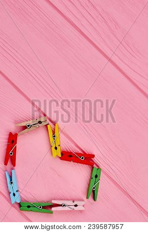 Colorful Heart From Clothespins, Top View. Group Of Colored Clothespegs Forming Shape Of Heart, Copy
