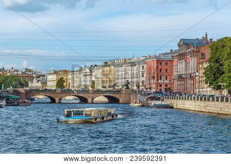 Fontanka River And Anichkov Bridge In Saint Petersburg, Russia
