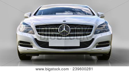 White Mercedes Benz Cls Coupe On A Gray Background. 3d Rendering