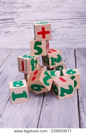 Educational Wooden Toys For Children. Colorful Geometric Figures On The Wooden Background. Ecologica