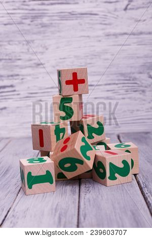 Educational Wooden Toys For Children. Colorful Geometric Figures On The Wooden Background. Ecologica