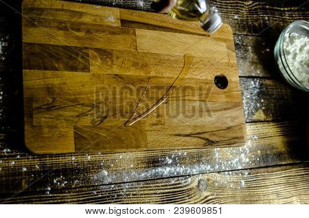 Dough Dainted By The Woman On The Board
