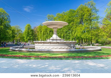 Warsaw, Poland - April 20, 2018: Historical Fountain In The Saxon Garden At Spring Time.