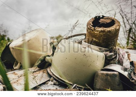 Kitchen Scrap Metal Lying On Top Of Rusty Zinc Roofing