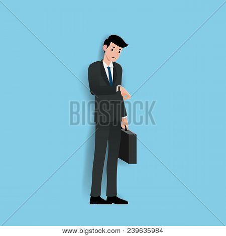 Businessman Look At His Watch To Check The Time And Waiting For Co-worker Or His Dealer About Minute