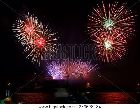 Red Pink Colorful Fireworks Explode In Malta In Dark Sky,malta Fireworks Festival, 4 July, Independe