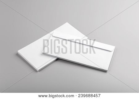 Photo Of White Envelope Isolated On Gray Background. Template For Branding Identity. For Graphic Des