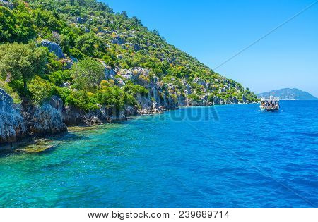 The Coast Of Kekova Island Is Famous For The Ruins Of The Ancient Sunken City, Visited By Tourist Gr