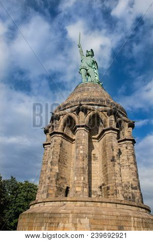 Hermann's Monument On Stone Pedestal In Front Of Sunny, Blue Sky