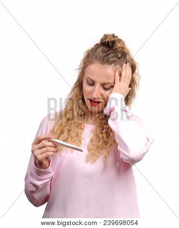Upset, Sad Woman With A Positive Pregnancy Test.