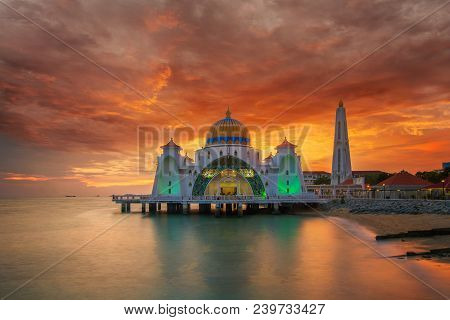 Malacca Mosque On The Beach In Melaka City With Sunset In Malaysia