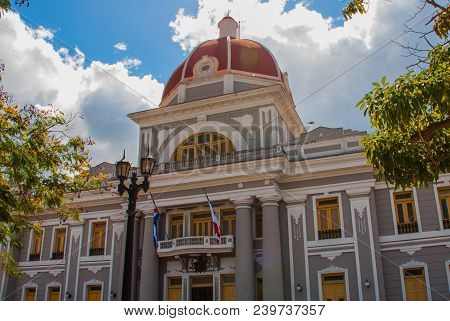 Cienfuegos, Cuba: Municipal Palace, City Hall. Government Palace On The Background Of Blue Sky With 