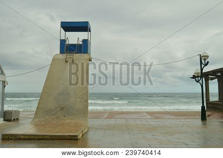 Beautiful Beach Of Zarauz With Its Picturesque And High Posts Of Lifeguards On A Rainy Day With Stro