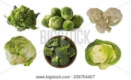 Different Kinds Of Cabbage In A Wooden Bowl. Broccoli, Brussels Sprouts, Roman Cauliflower, Green Ca