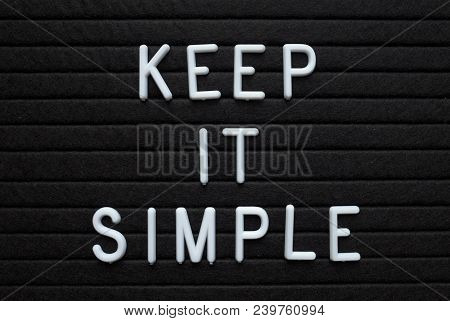 The Words Keep It Simple In White Plastic Letters On A Black Letter Board As A Reminder For When Pla