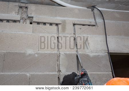 Slotting Of The Wall Under The Wiring With A Perforator.