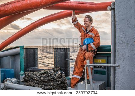 Marine Deck Officer Or Chief Mate On Deck Of Offshore Vessel Or Ship , Wearing Ppe Personal Protecti