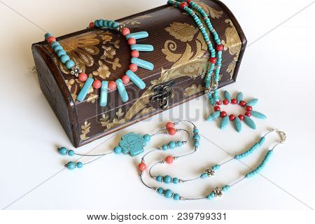 Turquoise And Red Coral Necklaces With Antique Gift Box Isolated On White