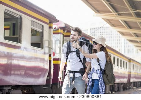 Multi-ethnic And Asian Couple, Backpack Travelers, Young Tourist Lover Travel In City Trip Together 