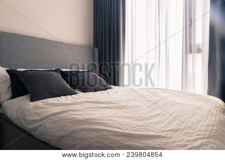 Modern King Size Bed In Narrow Condo Bedroom With Wrinkle Bedding Sheet Fabric, Pillow Cushion, Doub