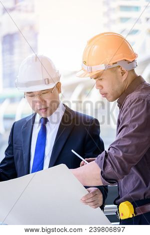 Two Asian Business And Engineer Man Has Planning And Working For Design Buiding And City.
