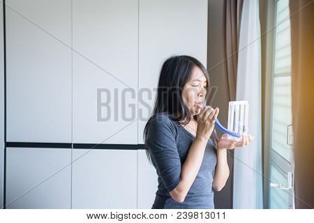 Patient Using Incentivespirometer Or Three Balls For Stimulate Lung