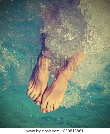 Woman During The Whirlpool Therapy In The Spa Pool With Vintage Effect