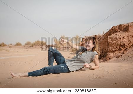 Girl Have Fun In Desert In A Summer Day