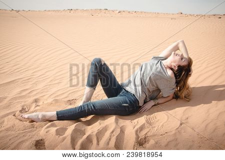 Girl Have Fun In Desert In A Summer Day