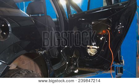 Automobile Diagnostic Service - Mechanics Working - Car For Repairing, Close Up