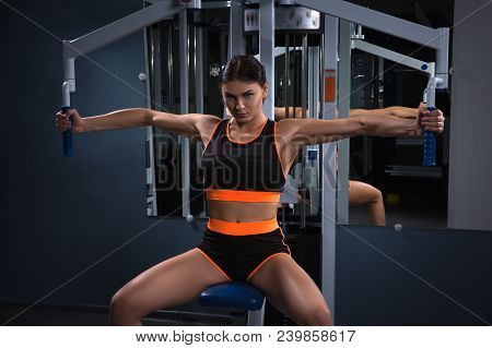 Sport. Beautiful Woman In Gym. Halthy Concept Fitness