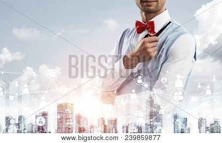 Double Exposure Of Confident And Young Businessman In Smart-casual Wear Smoking Pipe And Modern City