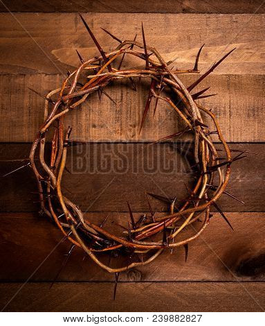 An Authentic Crown Of Thorns On A Wooden Background. Easter Theme