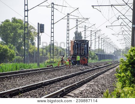 Staronozhesteblyevskaya, Russia - May 5, 2018: Workers Repair The Rails On The Railway. Railway Trac