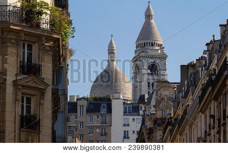 The Basilica Sacre Coeur Is A Roman Catholic Church Located At The Summet Of The Butte Montmartre , 