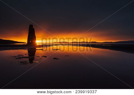 Is A Spectacular Rock In The Sea On The Northern Coast Of Iceland. Legends Say It Is A Petrified Tro