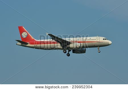 Passenger Airplane Landing At The Airport
