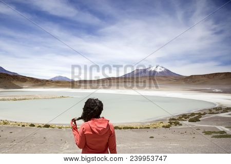 Young Woman At Laguna Hedionda At Eduardo Avaroa Andean Fauna National Reserve In Bolivia