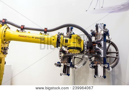 Hannover, Germany - April, 2018: Automatic Industrial Robot Fanuc R-2000ib Concept Auto Service Work