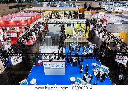 Hannover, Germany - April, 2018: Visitors In Exhibition Stands And Booths On Messe Fair In Hannover,